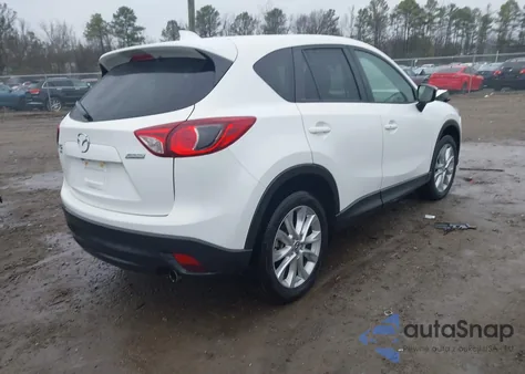 2015 Mazda Cx-5 Grand Touring z USA, uszkodzony, nr VIN JM3KE4DY8F0489930